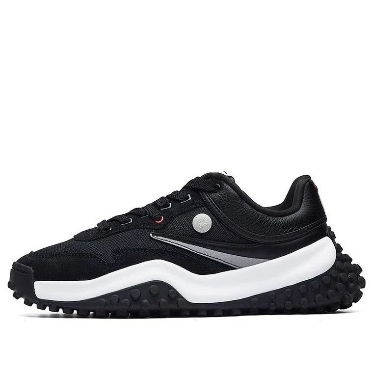 Chaussures basses Mihara x Fila T1 à pois, noires