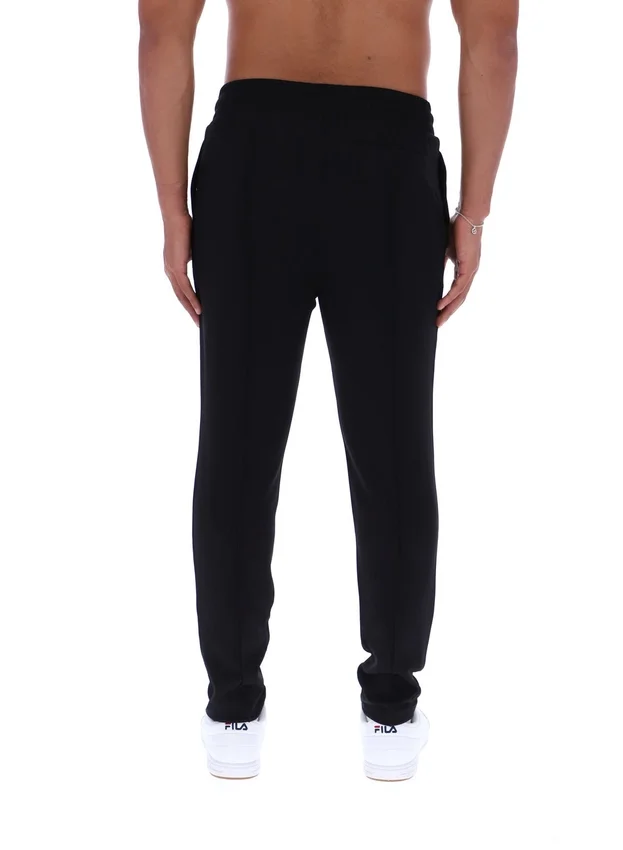 Pantalon slim noir Molveno à plis creusés