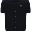 Polo Walter noir à mailles ajourées et empiècements en pointelle