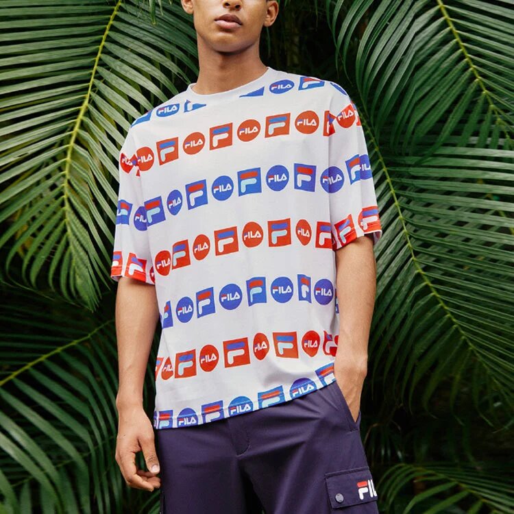 T-shirt de sport ample à col rond et manches courtes, imprimé logo intégral, blanc