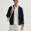 Veste à capuche en tricot avec logo brodé, bleue